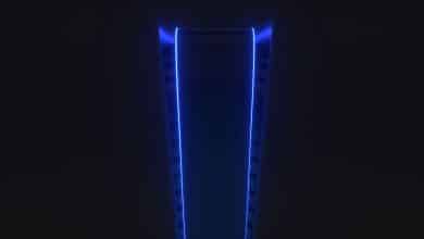 The blue glow of the PS5 in the dark