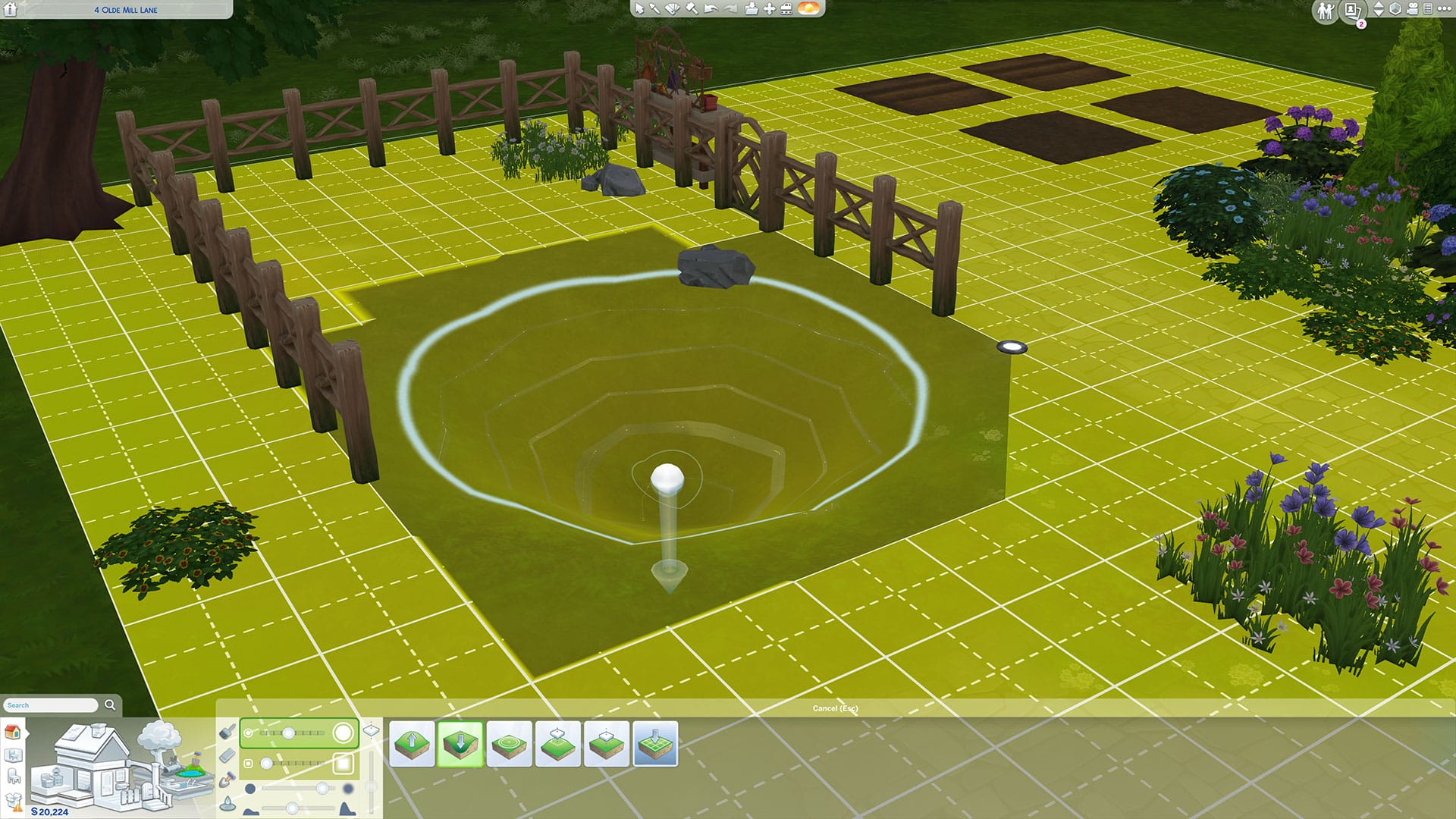 Utiliser les outils de terrain pour abaisser le sol pour construire un étang dans Les Sims 4