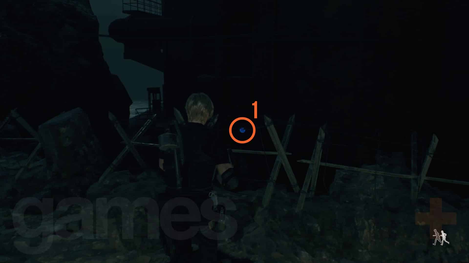 Resident Evil 4 Remake Cargo Depot médaillon bleu derrière une clôture de barbelés